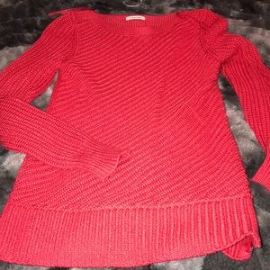 Salmon colored sweater in okay condition